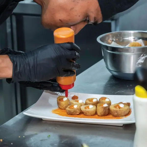 Chef finishing a plate