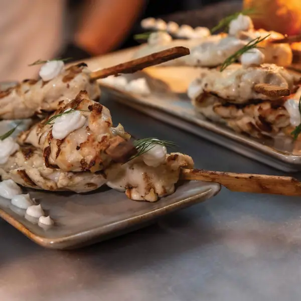 Chicken aioli skewers at the pass