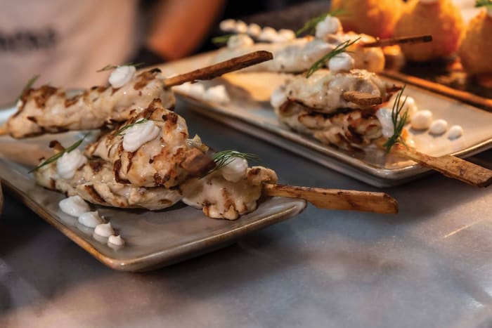 Grilled chicken skewers with garlic aioli